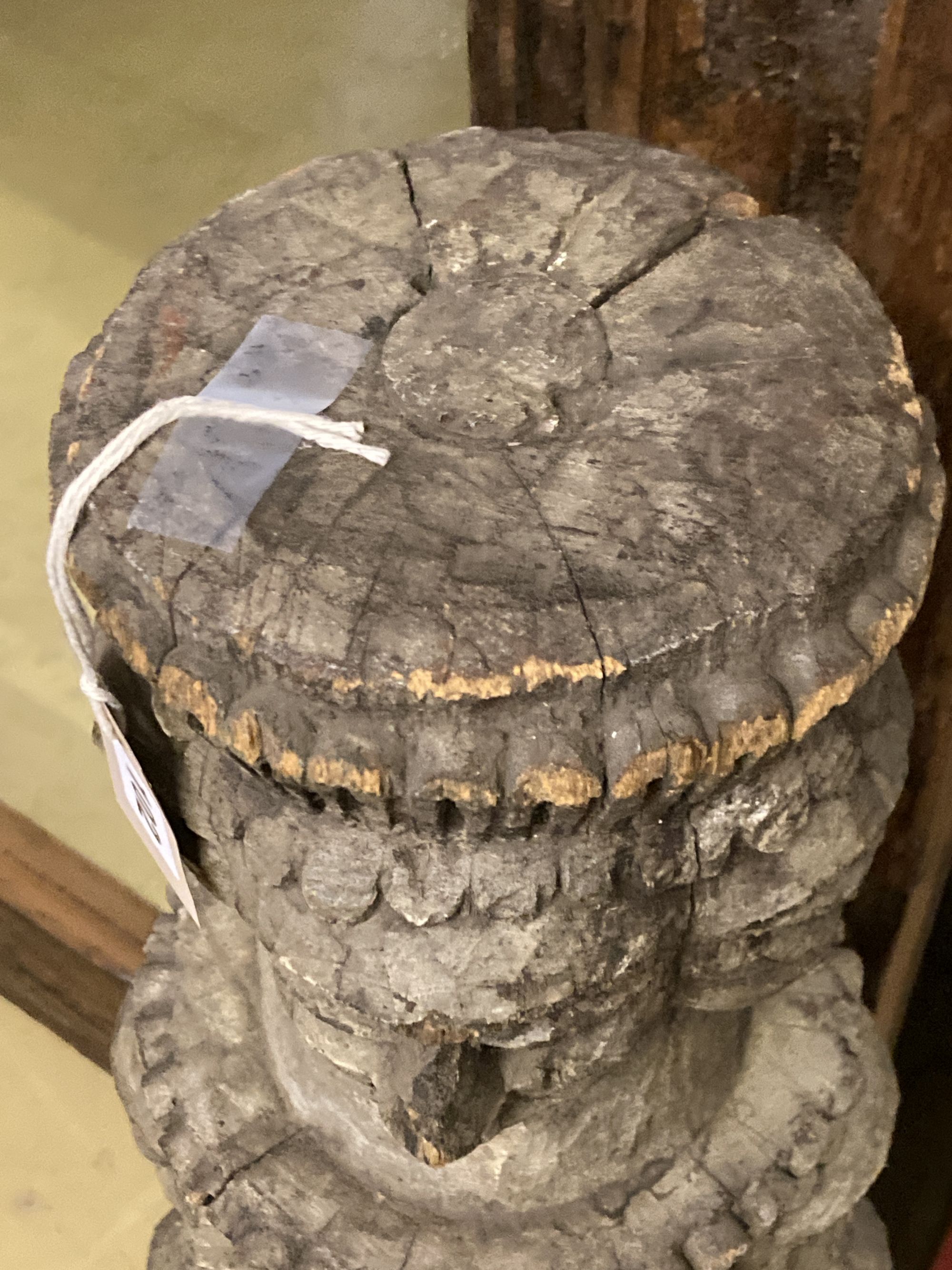 A South East Asian carved column, 90cm high